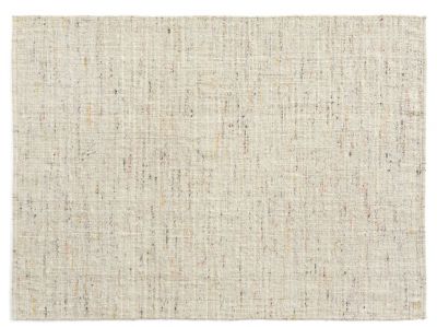 Detailaufnahme des Crayon Rug Teppichs von Hay, ein beiger Teppich mit farbigen Akzenten.